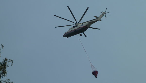 В область на борьбу с лесными пожарами прибыл еще один вертолет