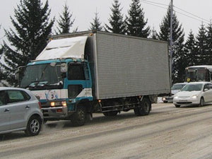 За проезд большегрузов по городу установили плату
